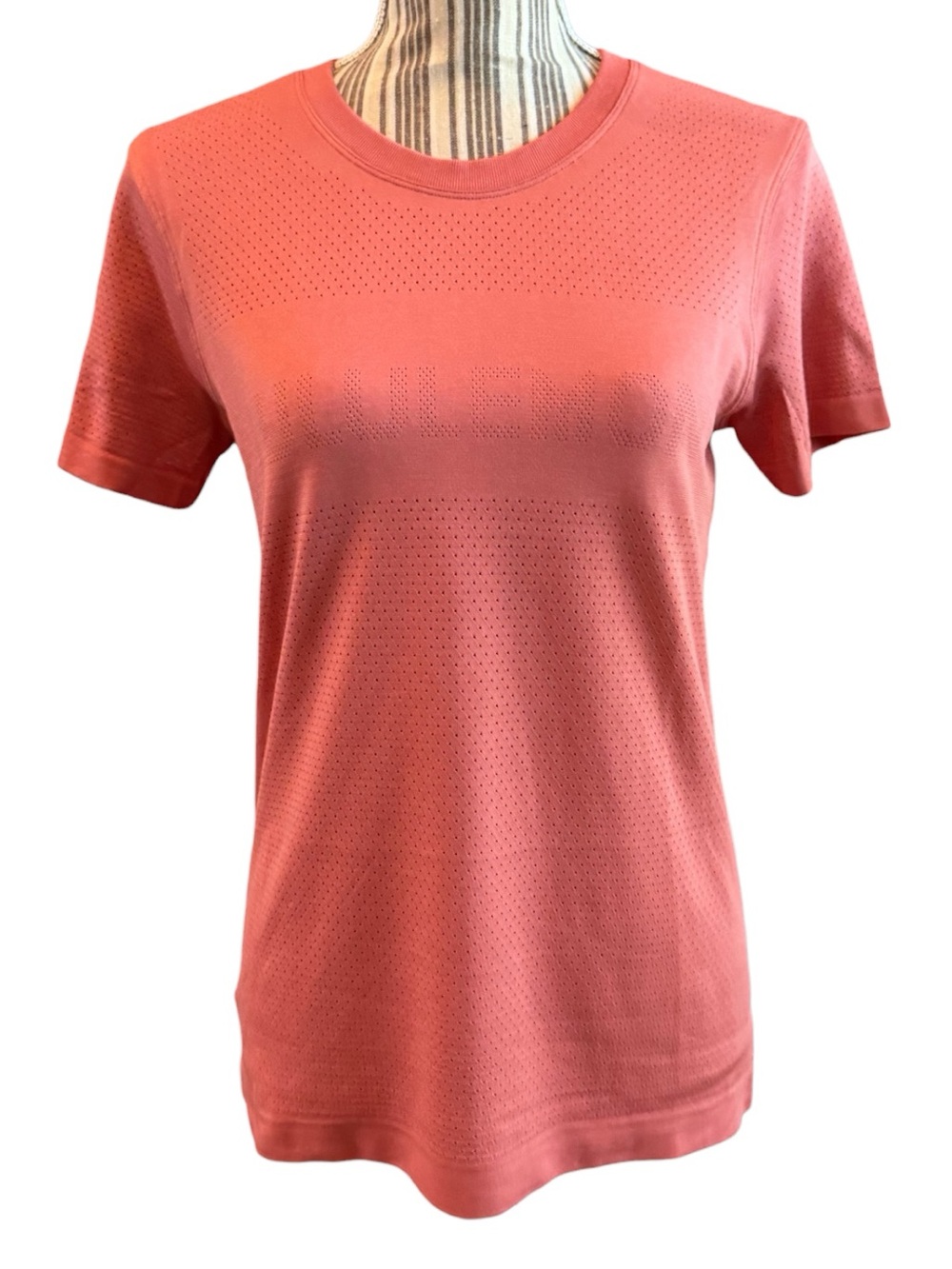lululemon athletica Coral Perforated Short Sleeve Tee brand on chest